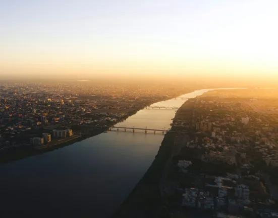 aerial view of city buildings during sunset