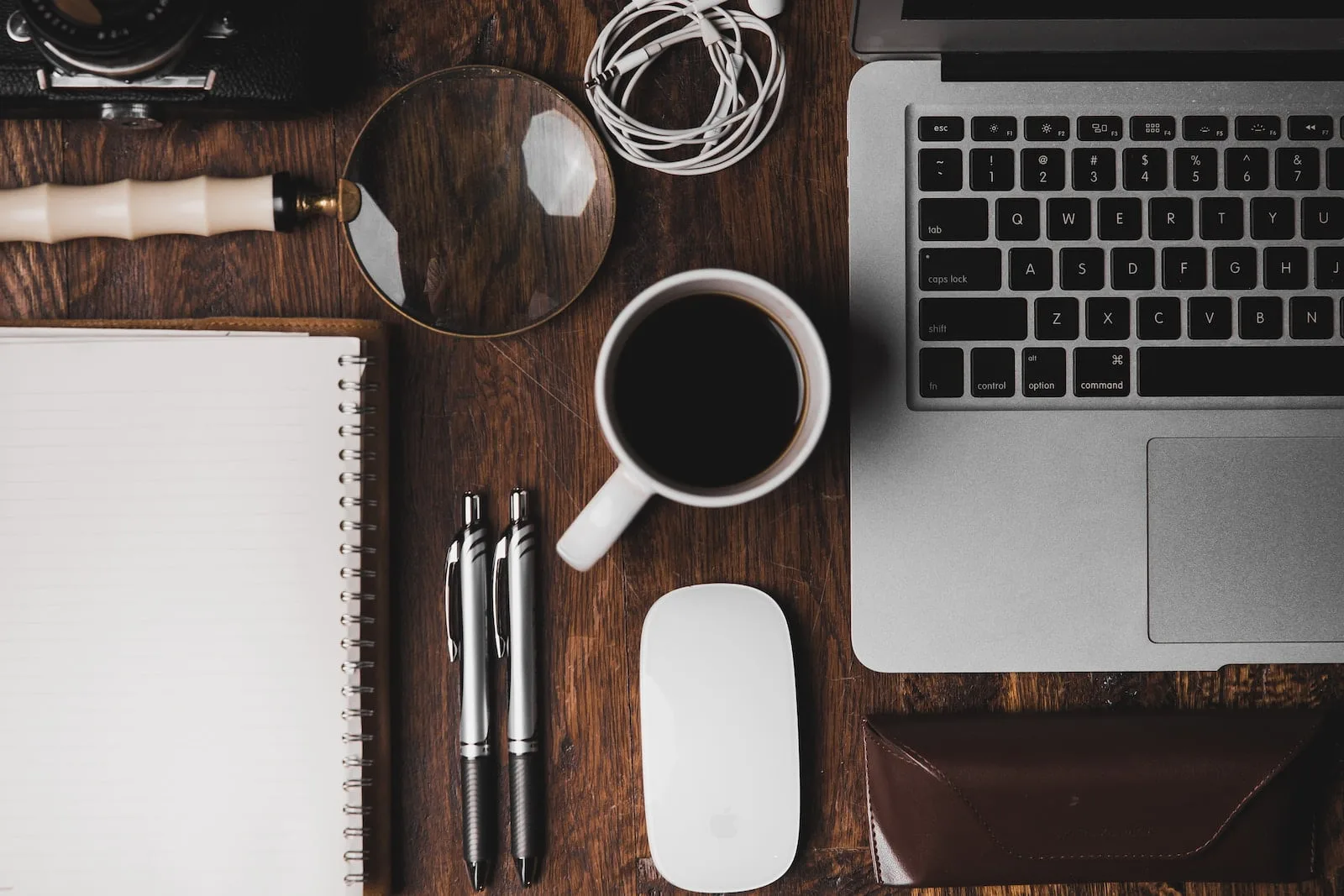Work With Us 5 cup of coffee near MacBook Pro
