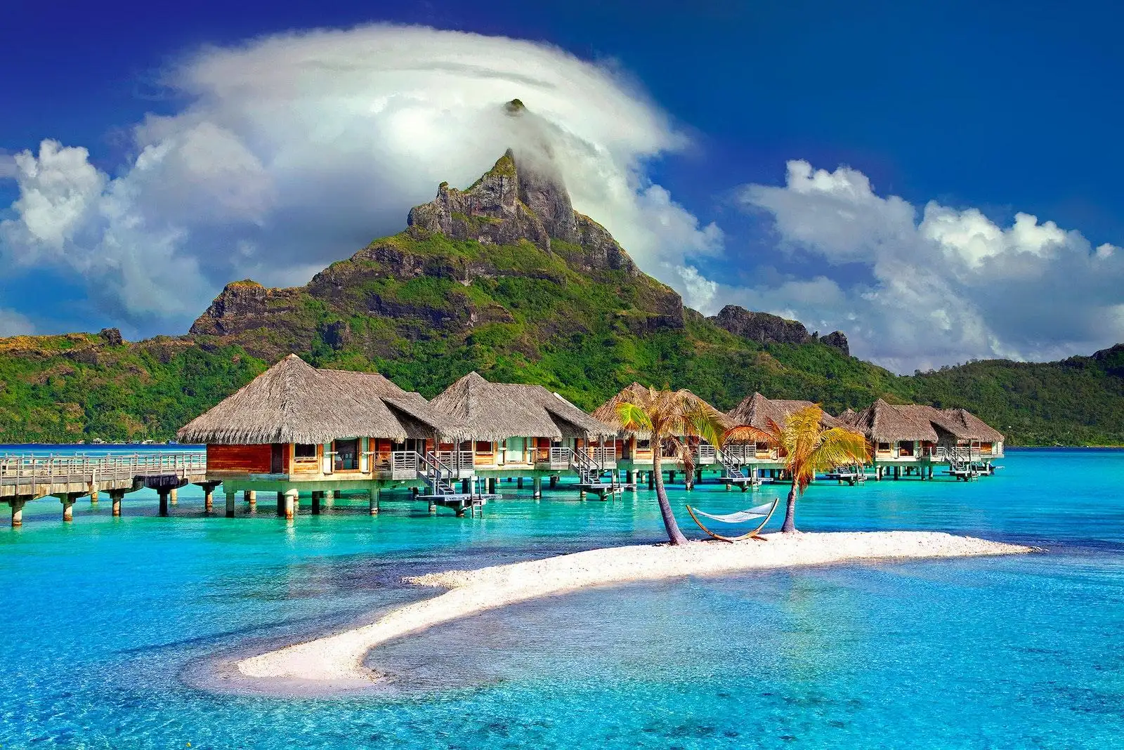 Photo by Julius Silver Cottages In The Middle Of Beach