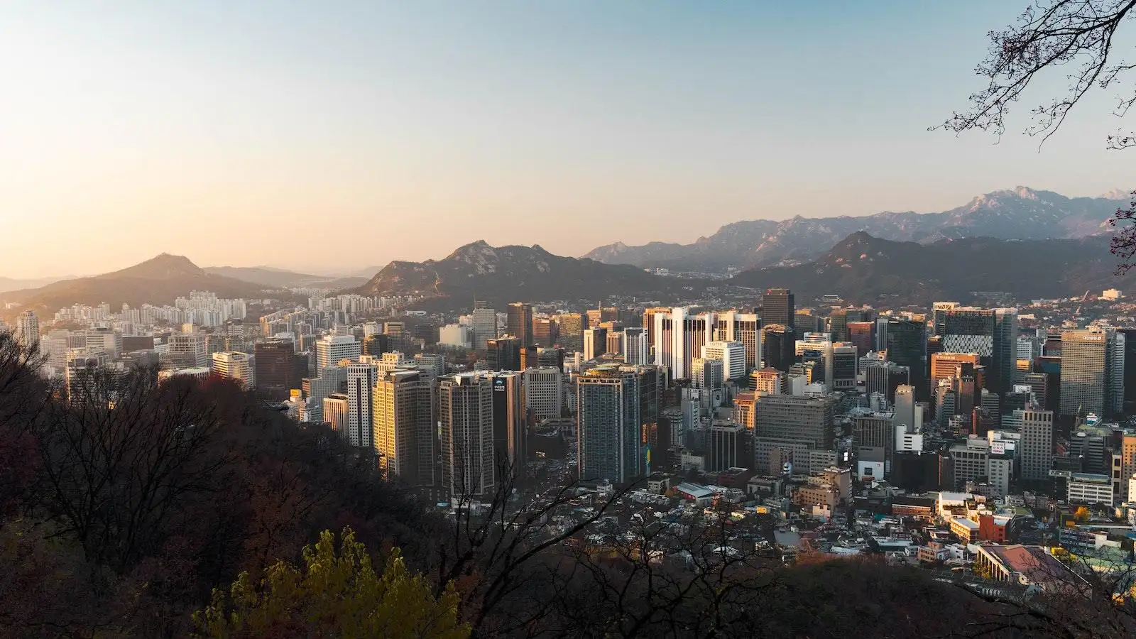 Urban Area Surrounded By Mountain Range