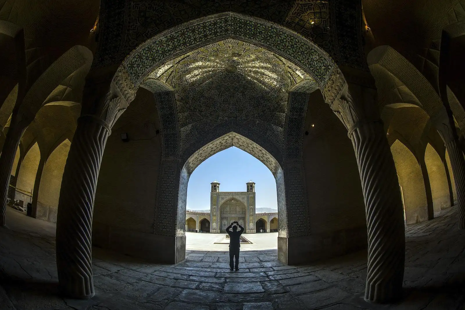 Photo by mostafa meraji Fisheye Shot Of A Person InSide A Building With Columns And Ornate Ceiling