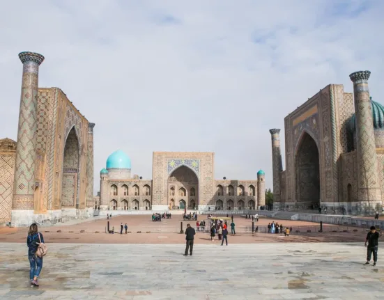 People Walking Around the Famous Registan in Samarkand