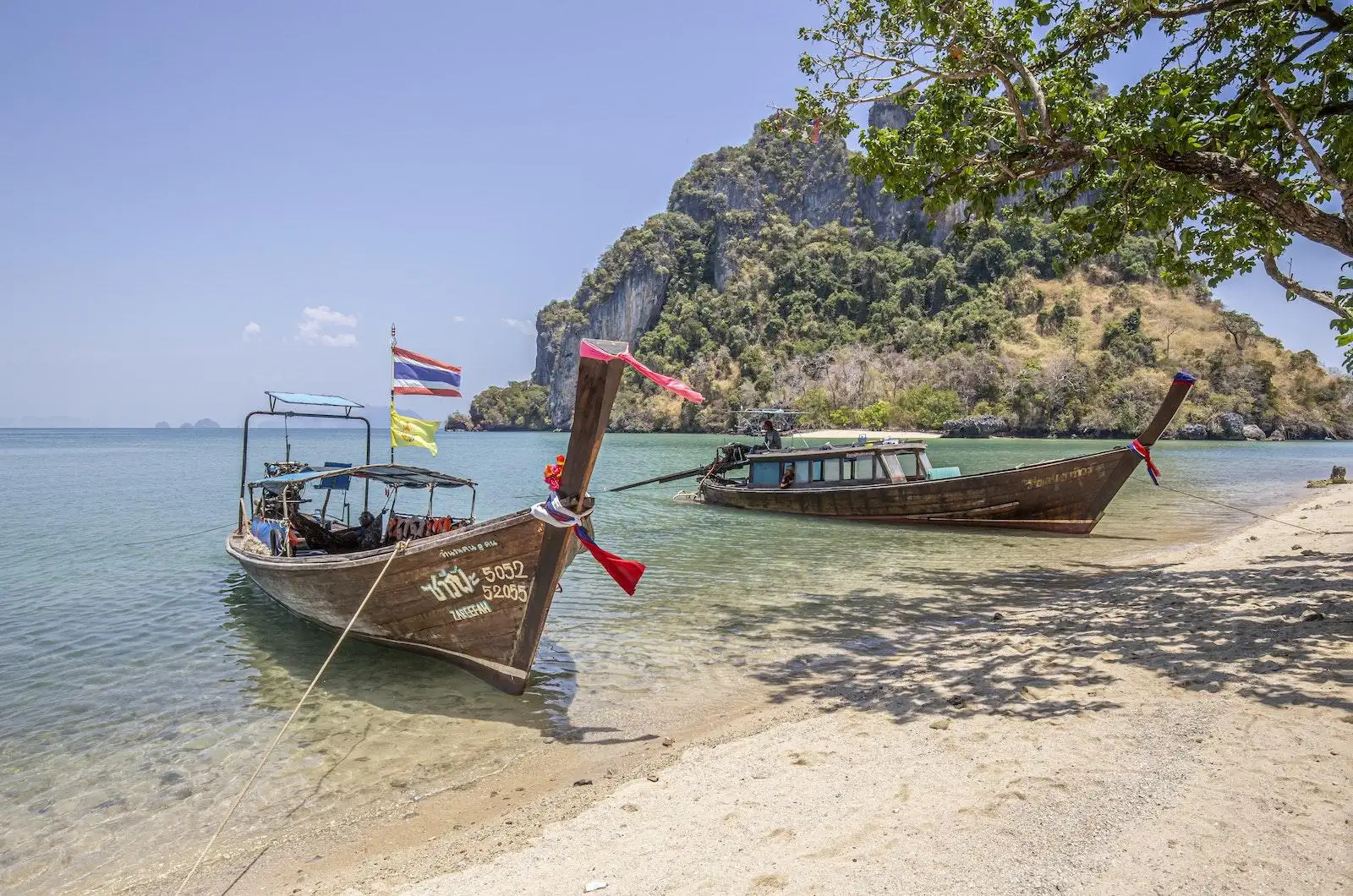 Photo by Erik Karits Wooden Boats on the Beach