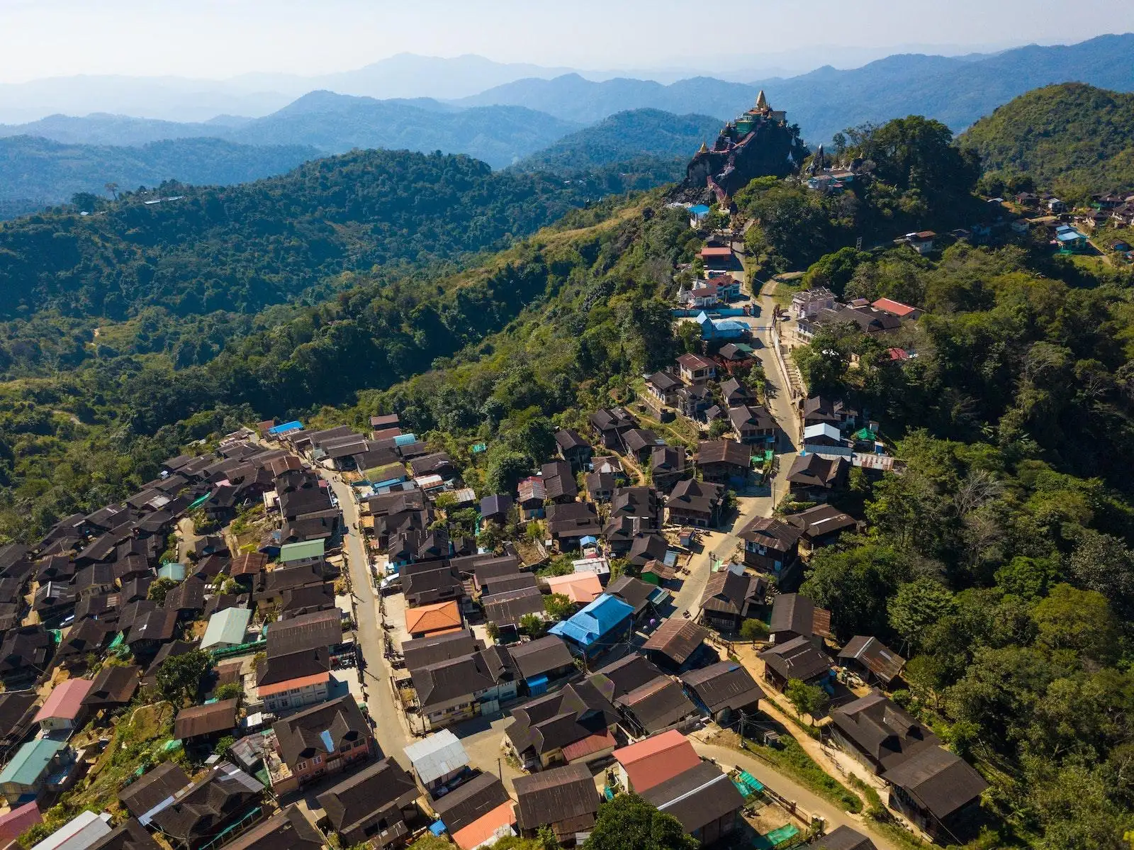 Photo by Tony Wu Aerial View of Houses on Mountain