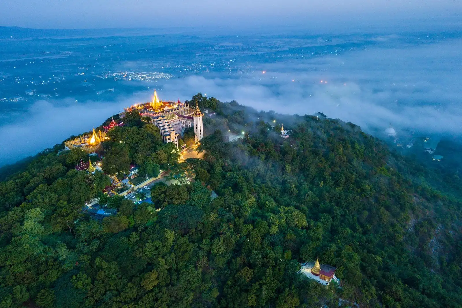 Photo by Tony Wu Aerial View of Mount Popa in Myanmar With Blue Sky