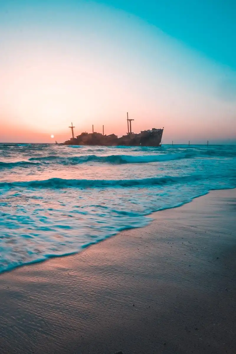 Photo by Sam Moghadam Khamseh brown ship on sea during daytime