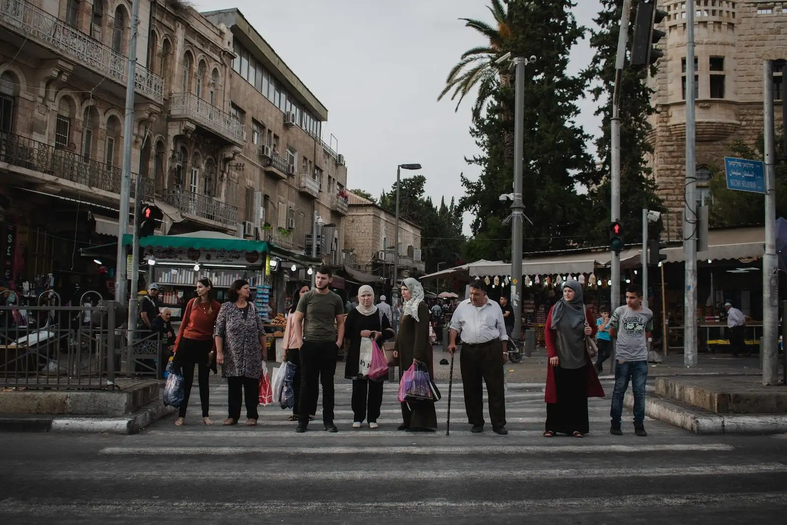 Photo by Levi Meir Clancy people standing on street during daytime