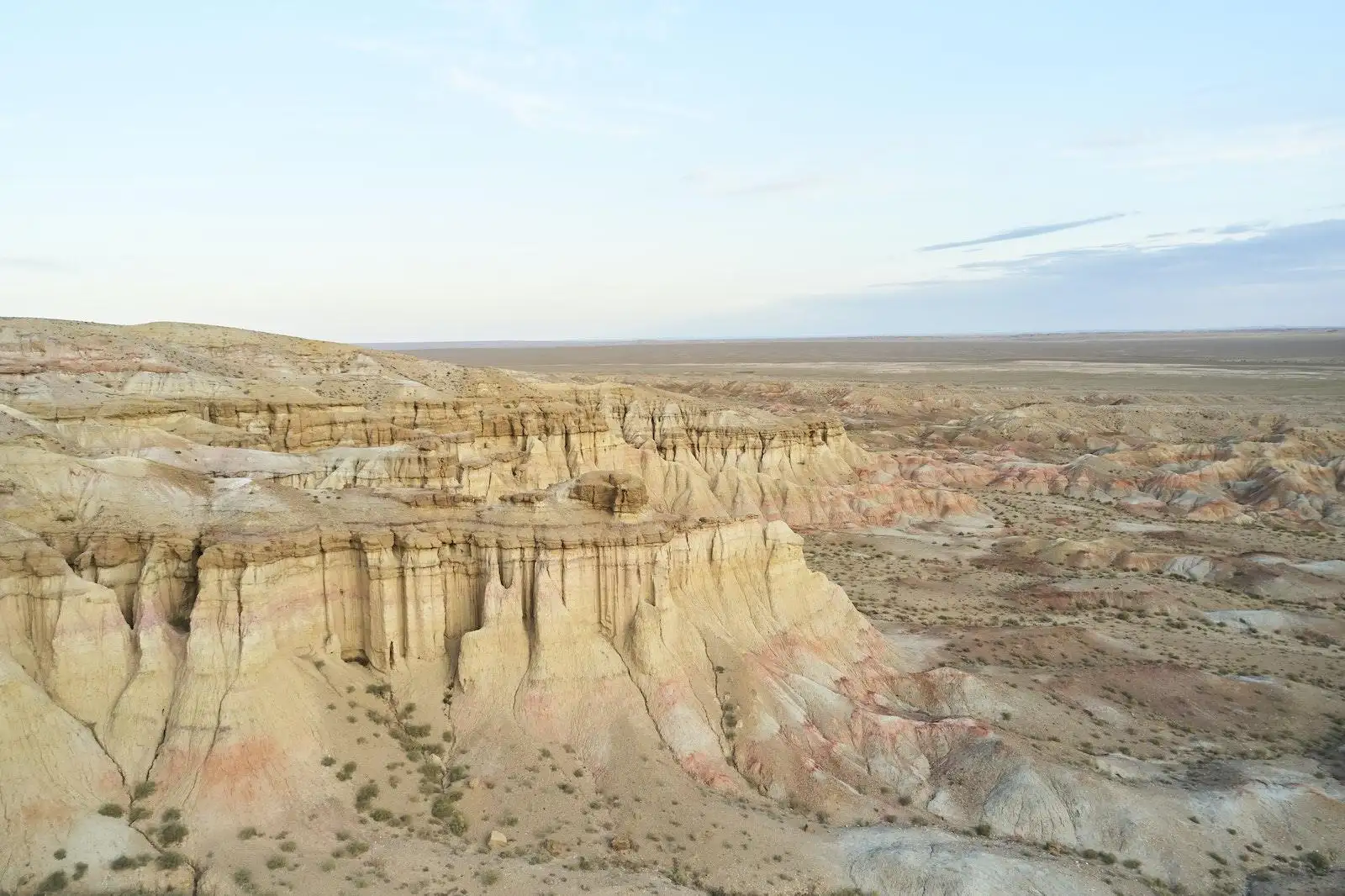 Photo by ArtHouse Studio Breathtaking view of Tsagaan Suvarga textured canyon and vast Mongolian desolate lands under clear blue sky