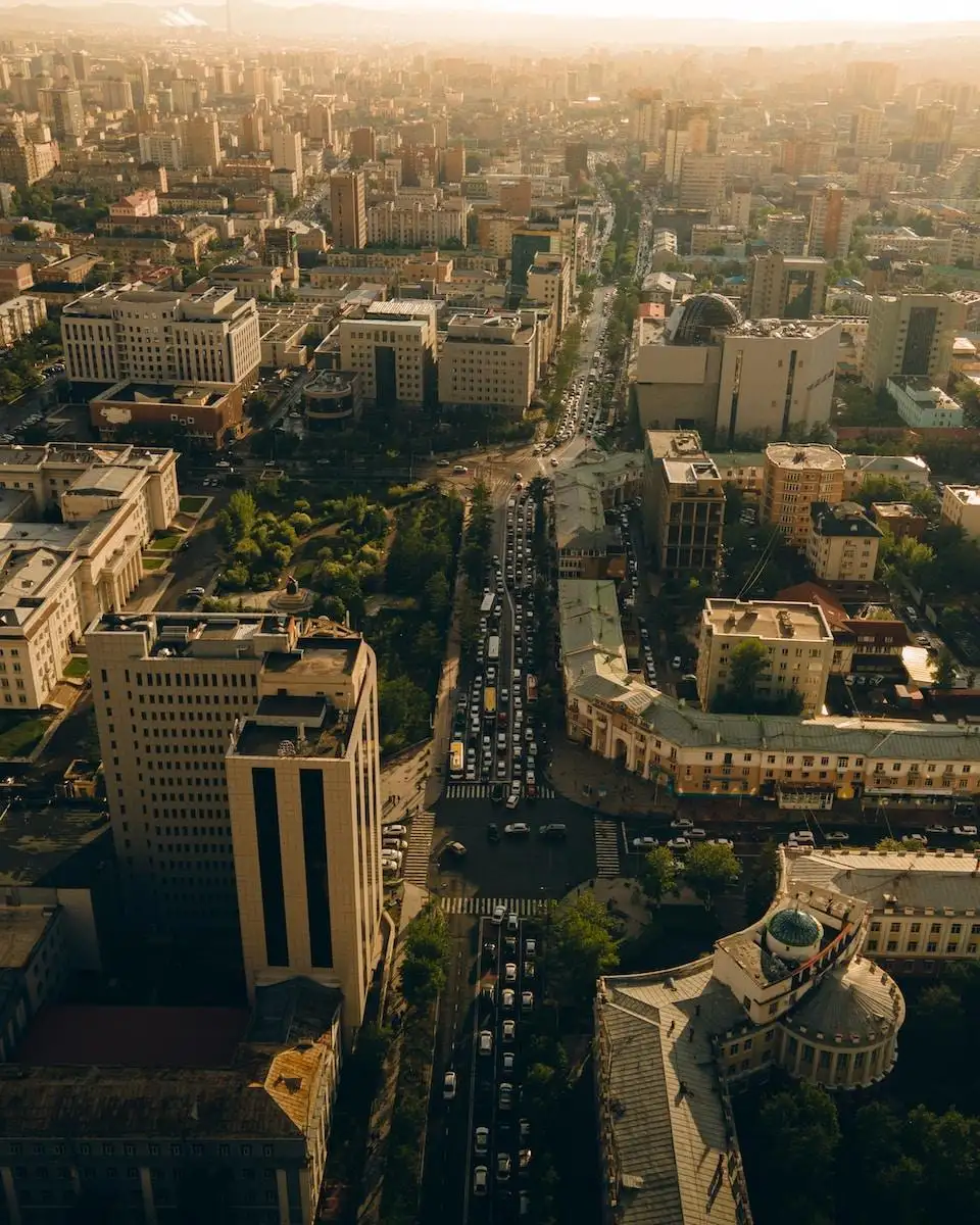 Photo by naraa .in.ub an aerial view of a city with tall buildings