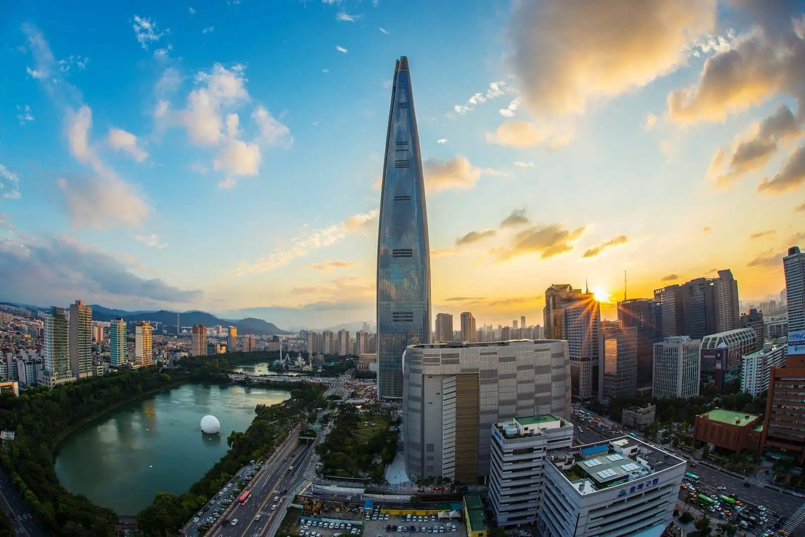 Photo by Pixabay Buildings and Body of Water during Golden Hour