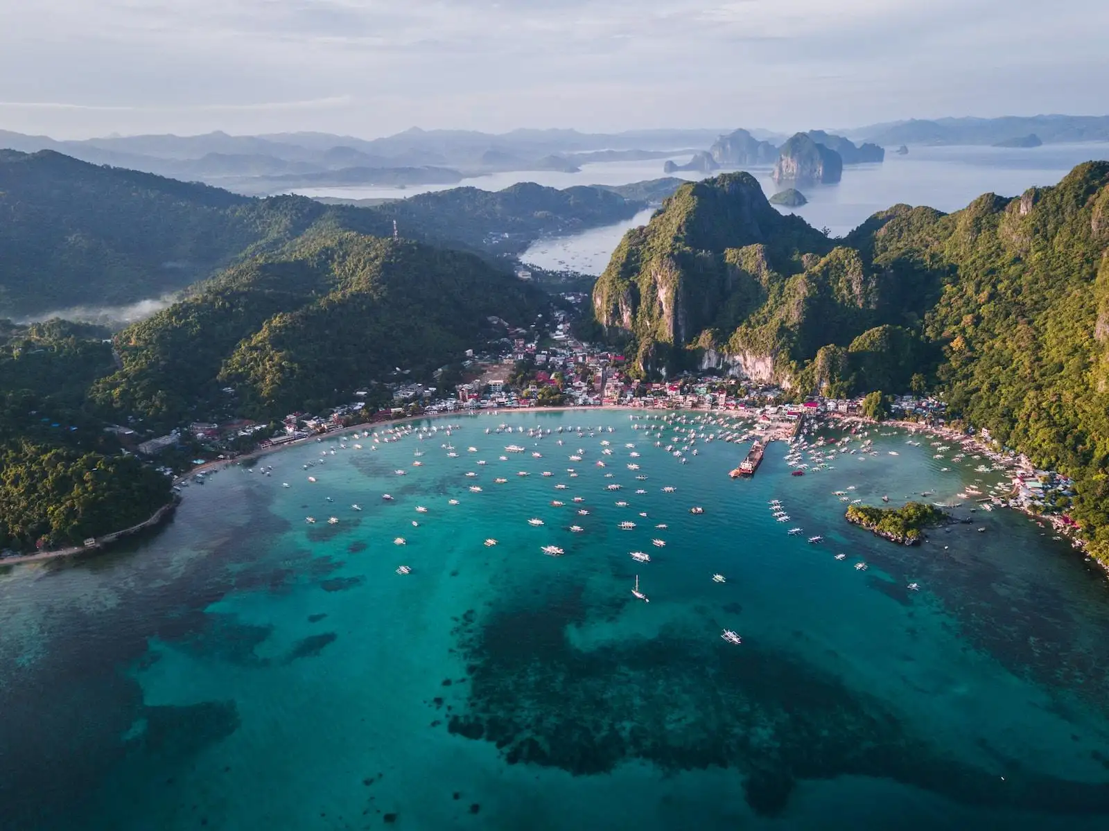 Photo by Eibner Saliba landscape photography of island with boats