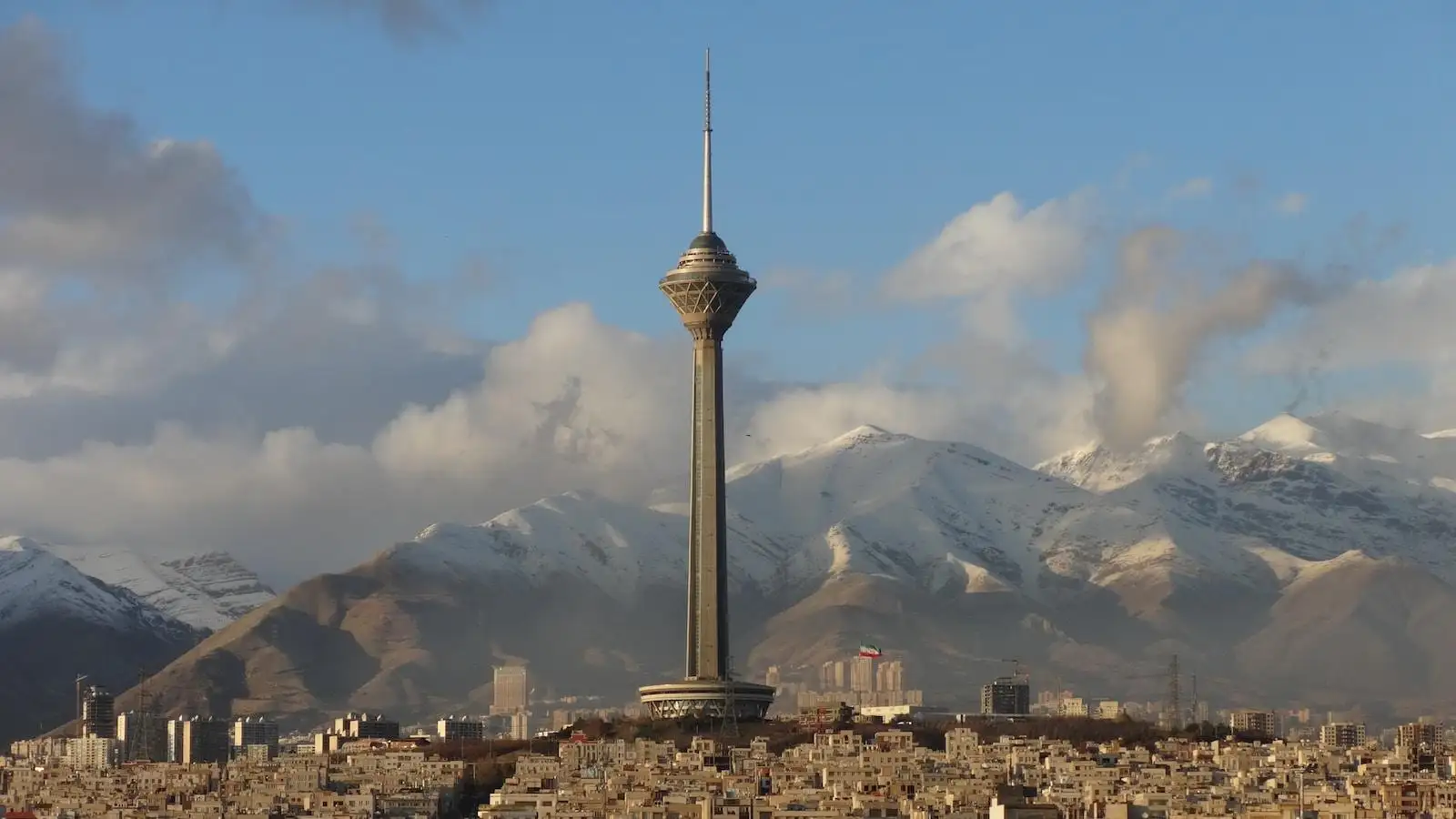 Photo by hassan hedayatzadeh gray concrete tower under blue sky