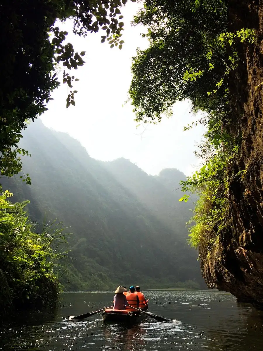 Photo by Just Filip group of people on boat paddling during daytime